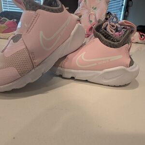 Nike Kids Pink and White Slip-On Sneakers